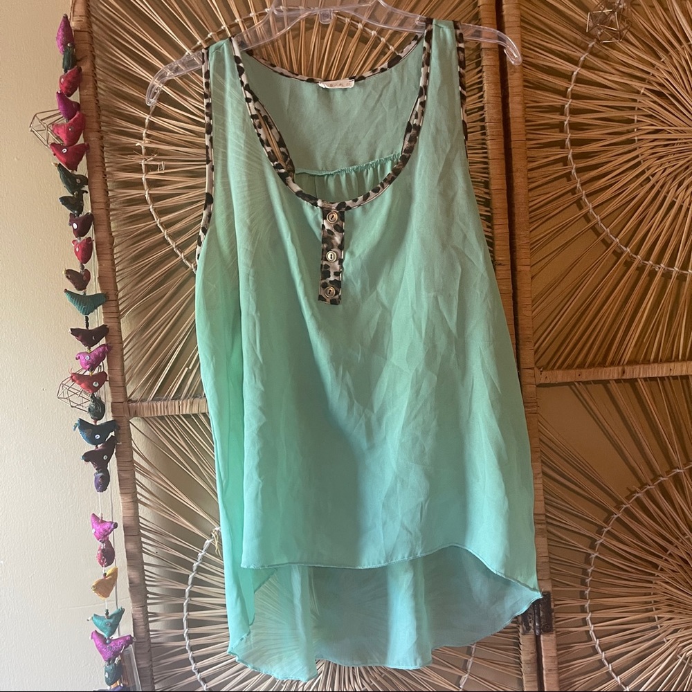 E&M | teal tank